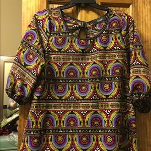 Sassy elbow length top with faux leather trim